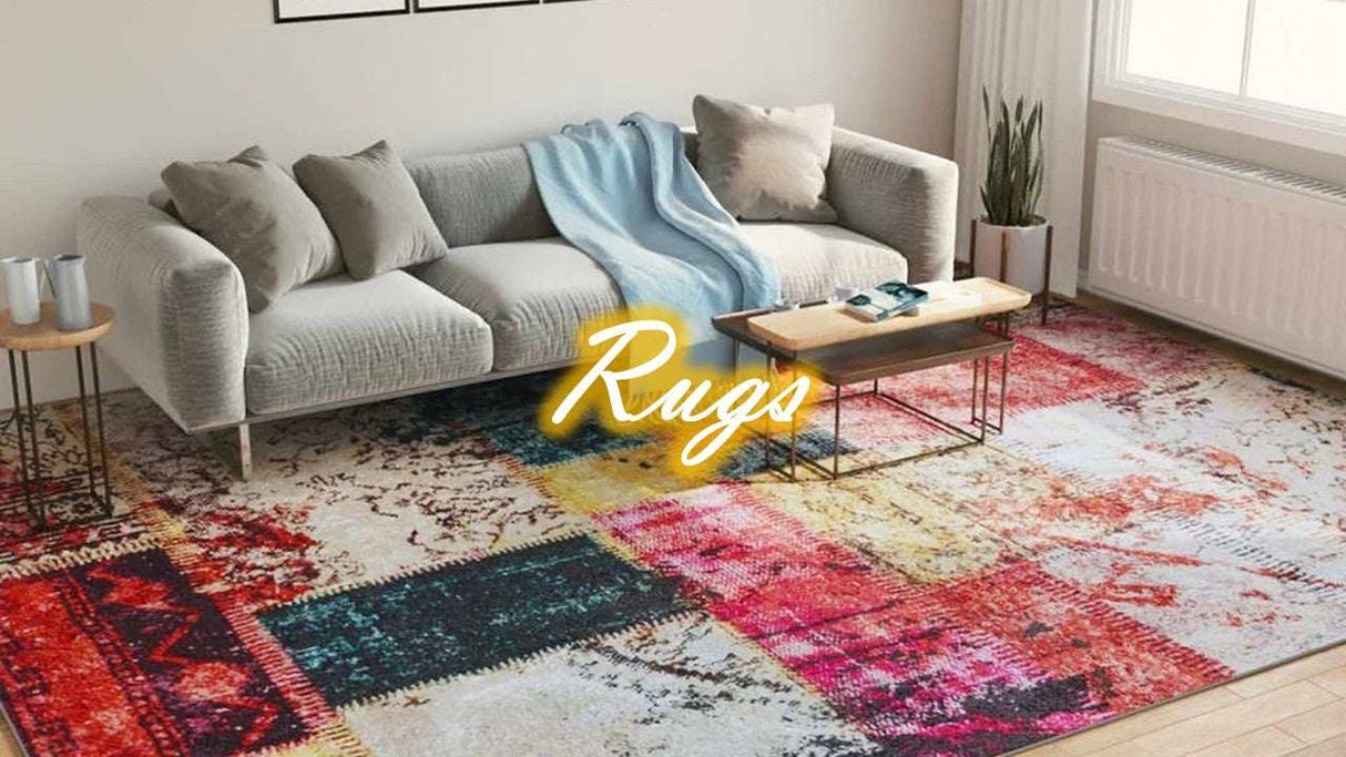 Stylish traditional rug in vibrant colours enhancing a modern living room with a cosy sofa