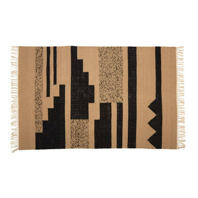 Orsina Trenza Rug with geometric patterns in tan and black, perfect for modern home decor