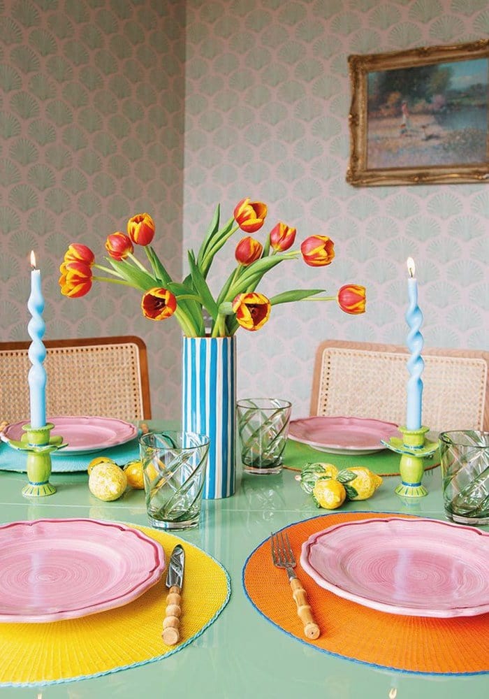 Casa by Josephine Jenno vibrant tumbler glasses on an elegantly set dining table with colourful plates
