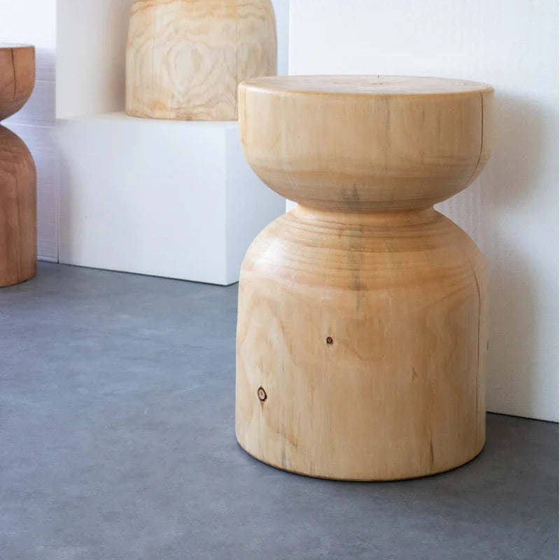 Natural wooden side table with a round design, perfect for modern home decor