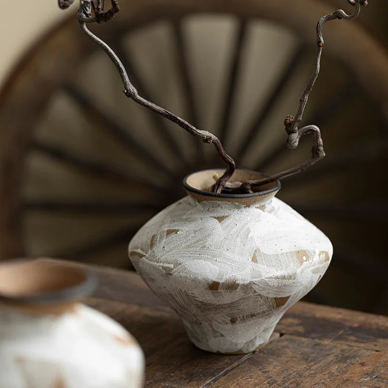 Handcrafted Nisu Home vase with a unique design, perfect for adding elegance to any decor