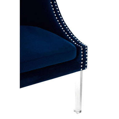 Luxurious Orsina Velvet Chair in deep blue with elegant studded detailing and clear acrylic legs