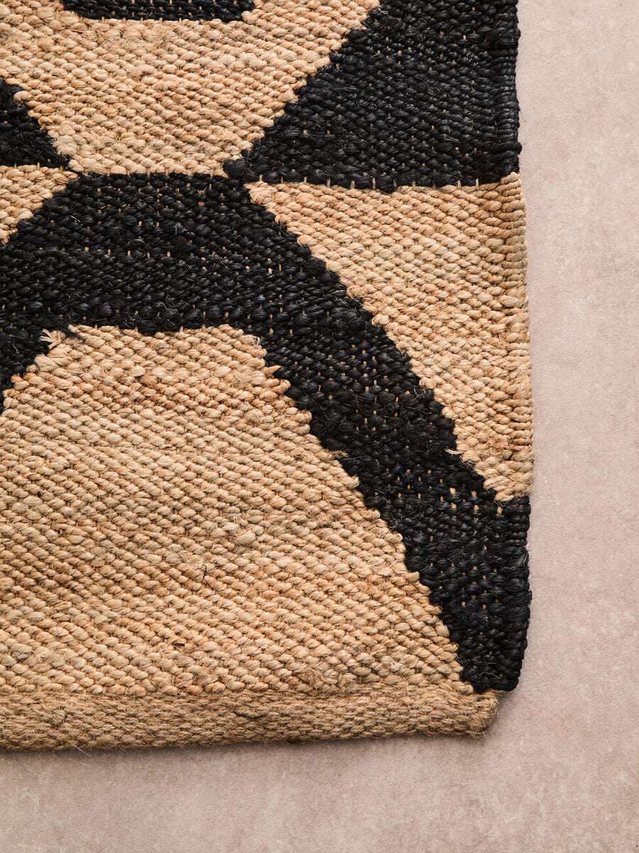 Orsina Hemp Rug featuring a natural woven design with bold black patterns for a stylish home decor