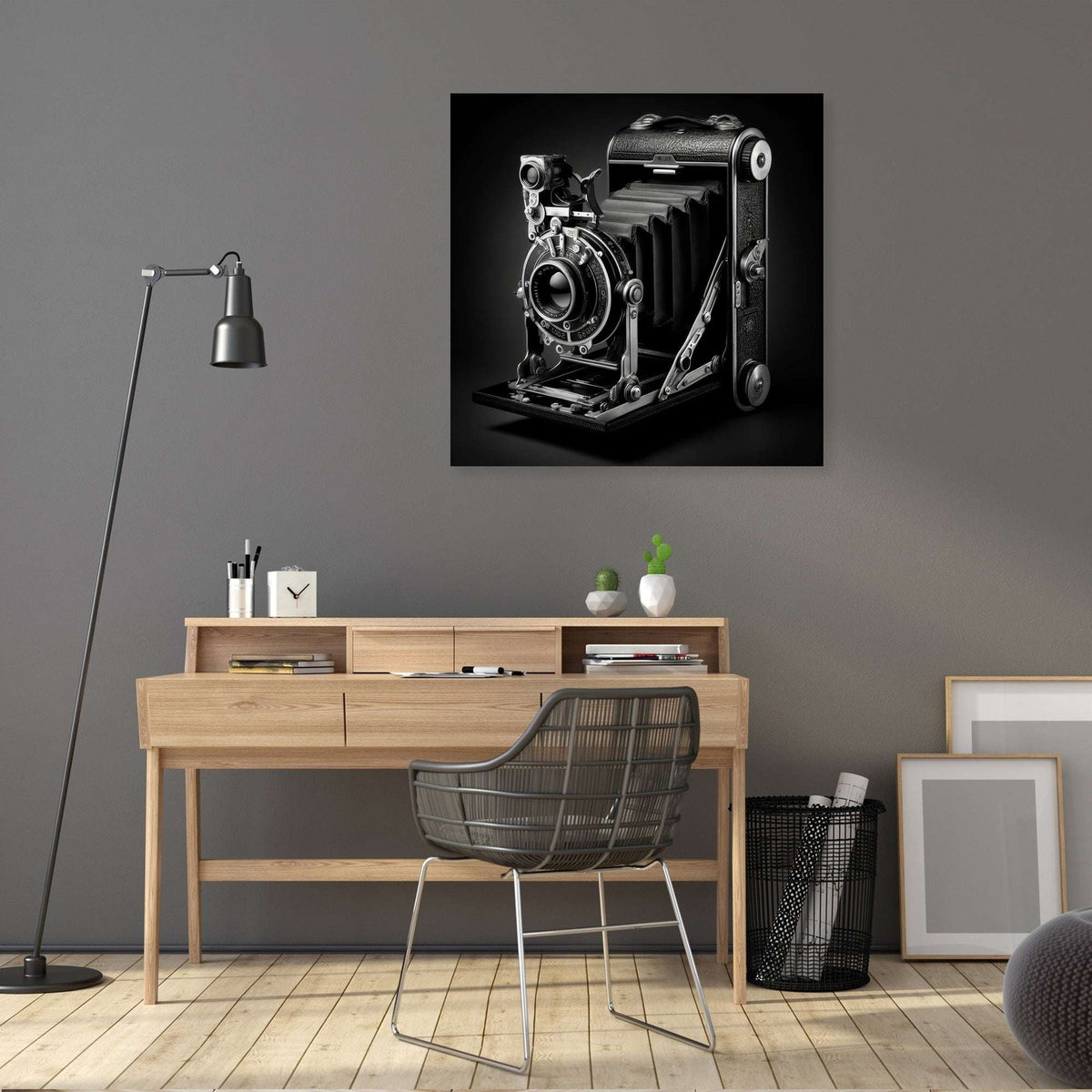 Vintage black and white wall art canvas featuring an old-fashioned camera mounted on a grey wall