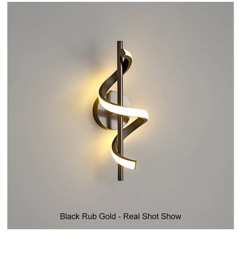 Elegant Black Rub Gold Wall Light featuring a modern twisted design for stylish illumination
