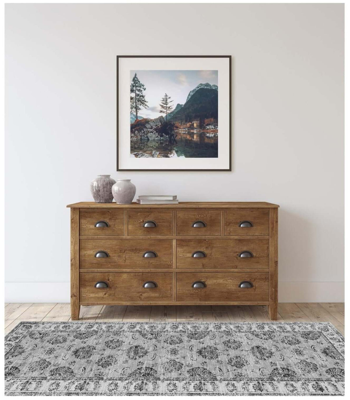 Elegant washable rug in grey and white design placed under a wooden dresser in a modern living room