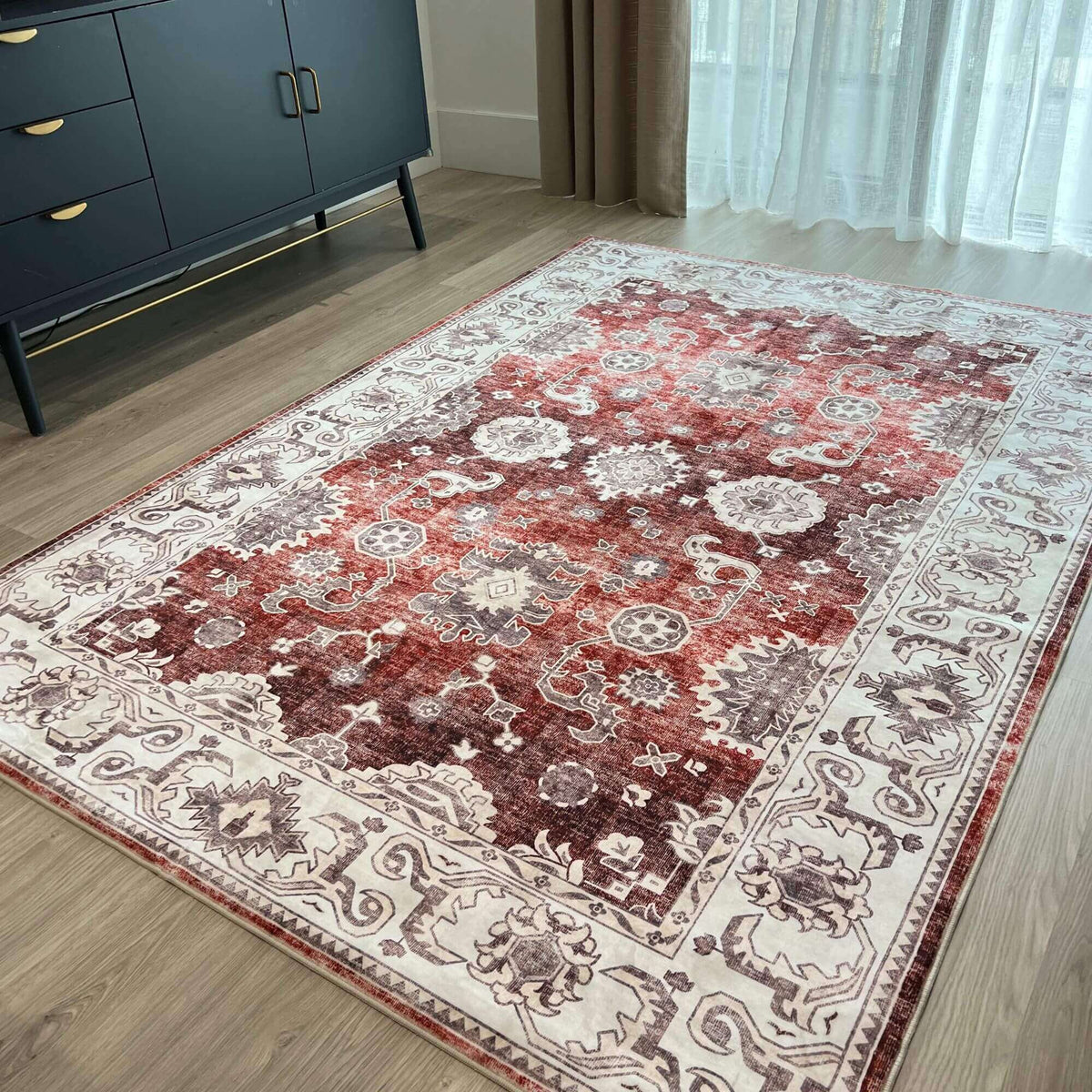 Traditional patterned washable rug in rich burgundy and cream tones for interior decor