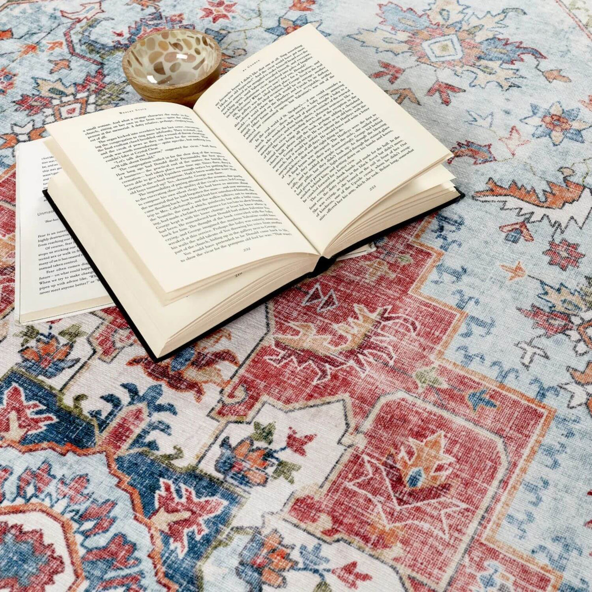 A beautiful Washable Rug featuring intricate floral patterns, ideal for enhancing living spaces