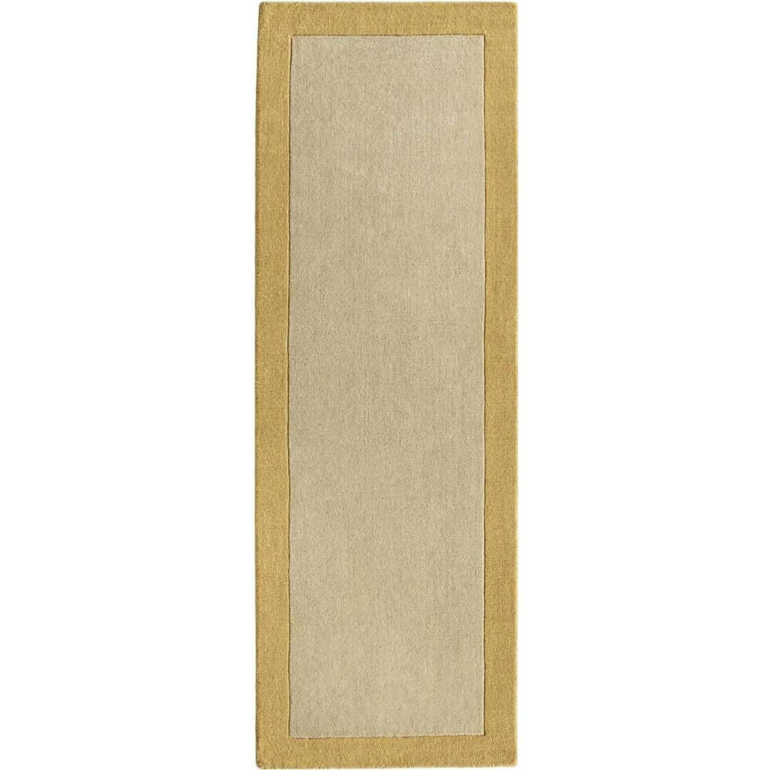 Elegant wool rug with a soft beige centre and a contrasting yellow border for stylish home decor