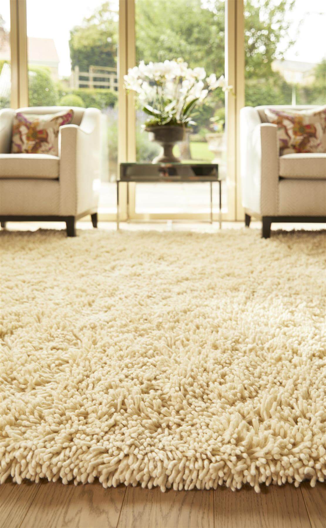 Luxuriously soft wool rug in creamy white, perfect for enhancing living room aesthetics