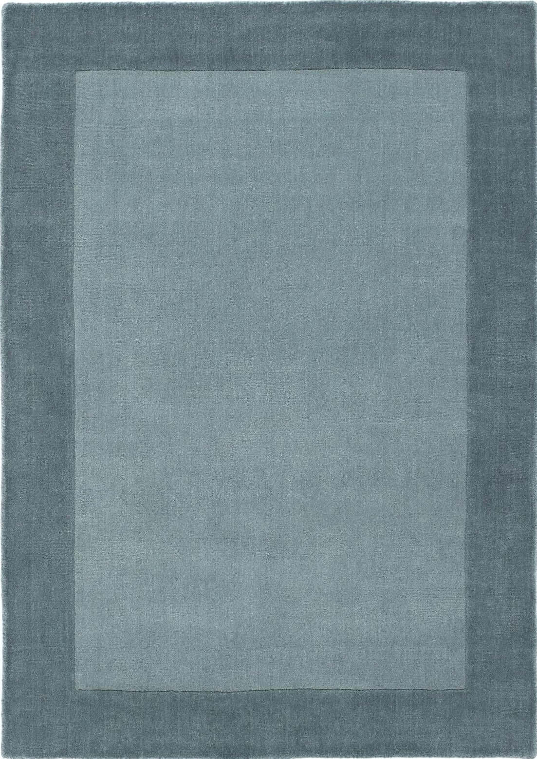 Soft blue Wool Rug with a modern design, perfect for adding elegance to any room