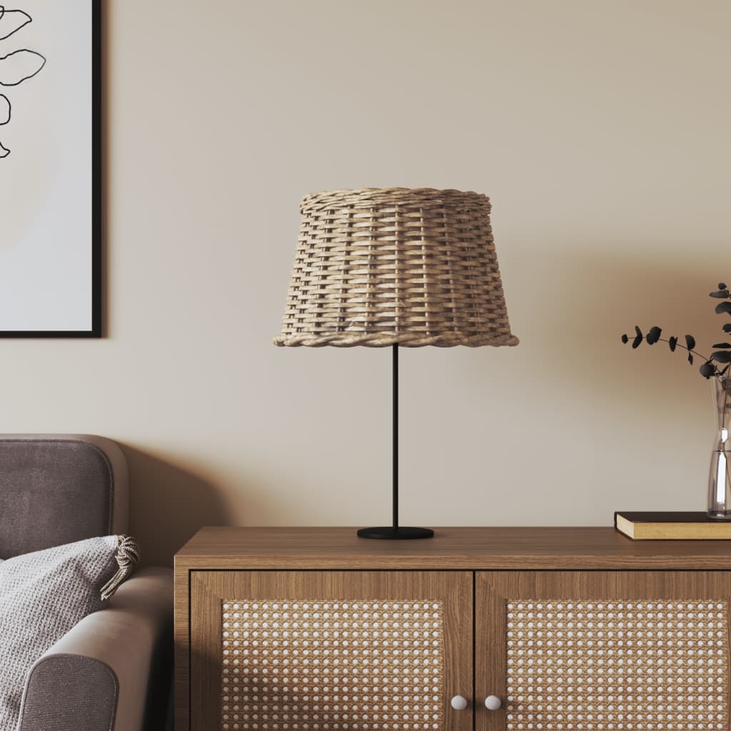 Natural woven lamp shade on a black metal lamp in a stylish living room setting