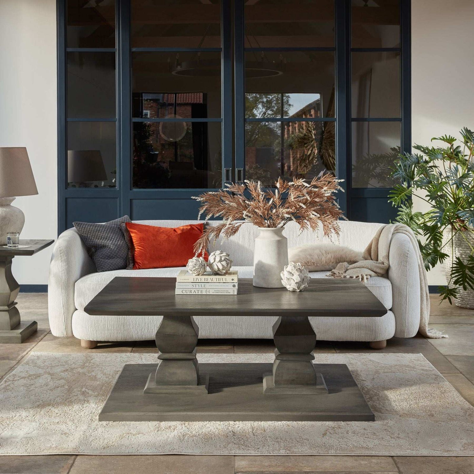 Stylish living room featuring a comfortable sofa and trendy coffee table, ideal for home furniture decor