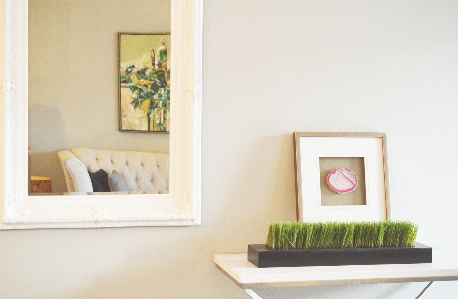 Elegant interior showcasing the Mirrors and Shelving Collection with a decorative mirror and modern decor