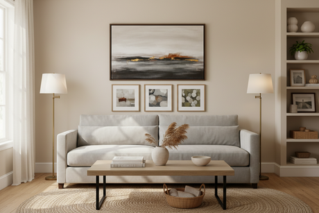 Elegant living room featuring stylish wall art above a sofa with neutral tones and modern decor