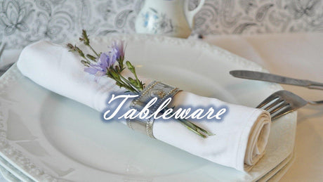 Elegant tableware collection featuring beautifully arranged napkin and floral decoration for any occasion