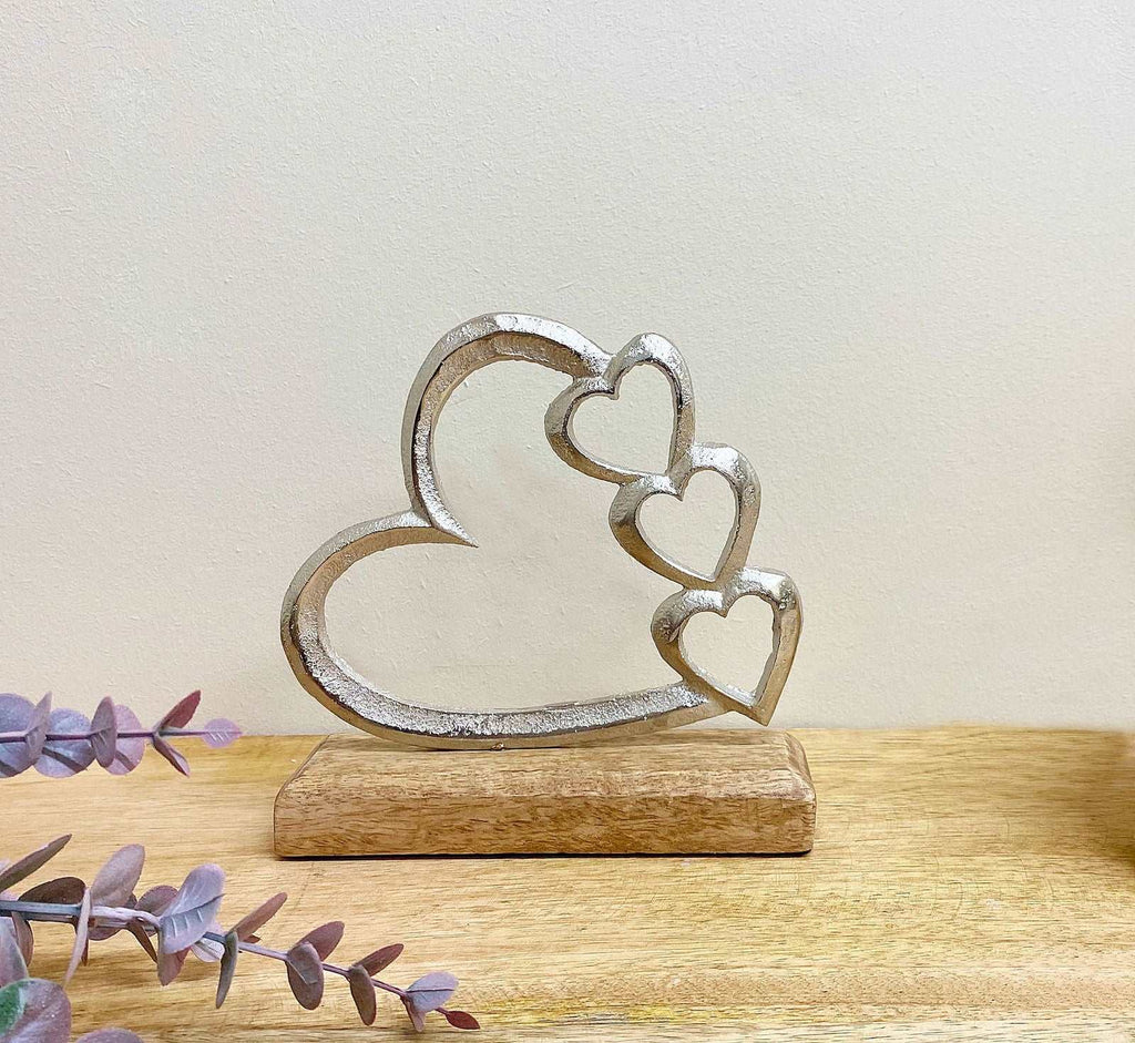 Metal Silver Four Heart Ornament On A Wooden Base Small Geko Products