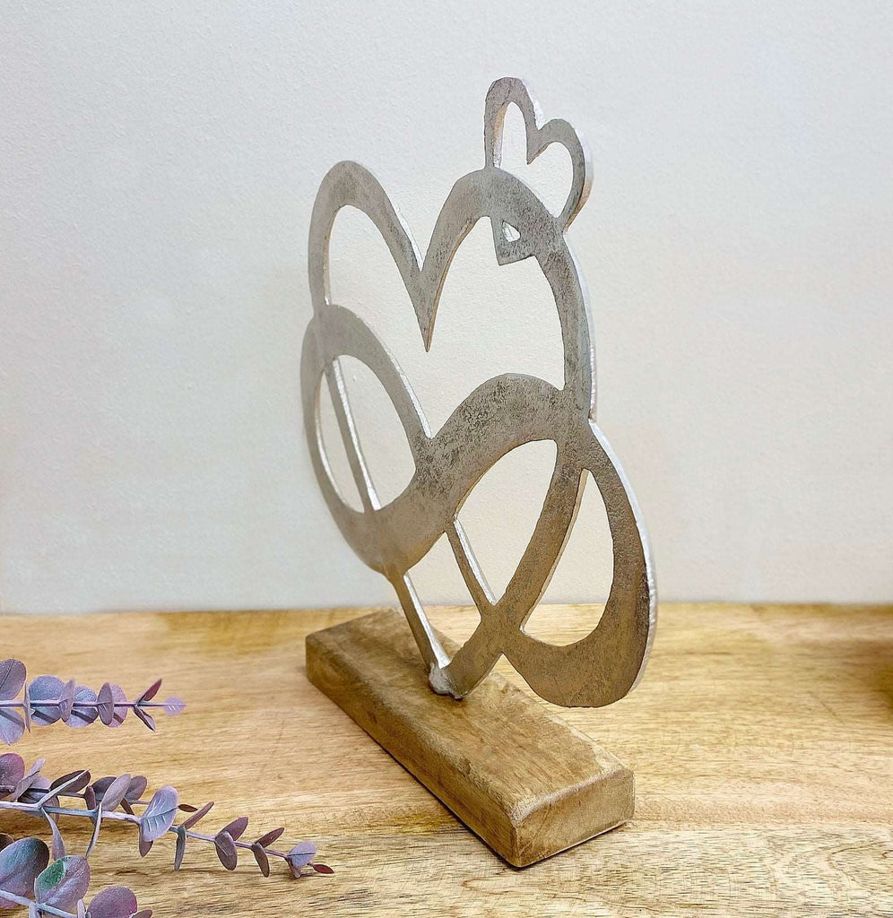 Metal Silver Four Heart Ornament On A Wooden Base Small Geko Products