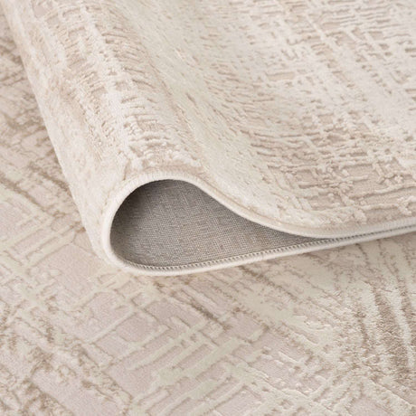Soft beige Abstract Rug with textured design, ideal for modern home decor and comfort