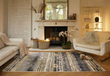 Stylish living room with an Abstract Rug in blue and beige tones, enhancing the cosy atmosphere by the fireplace