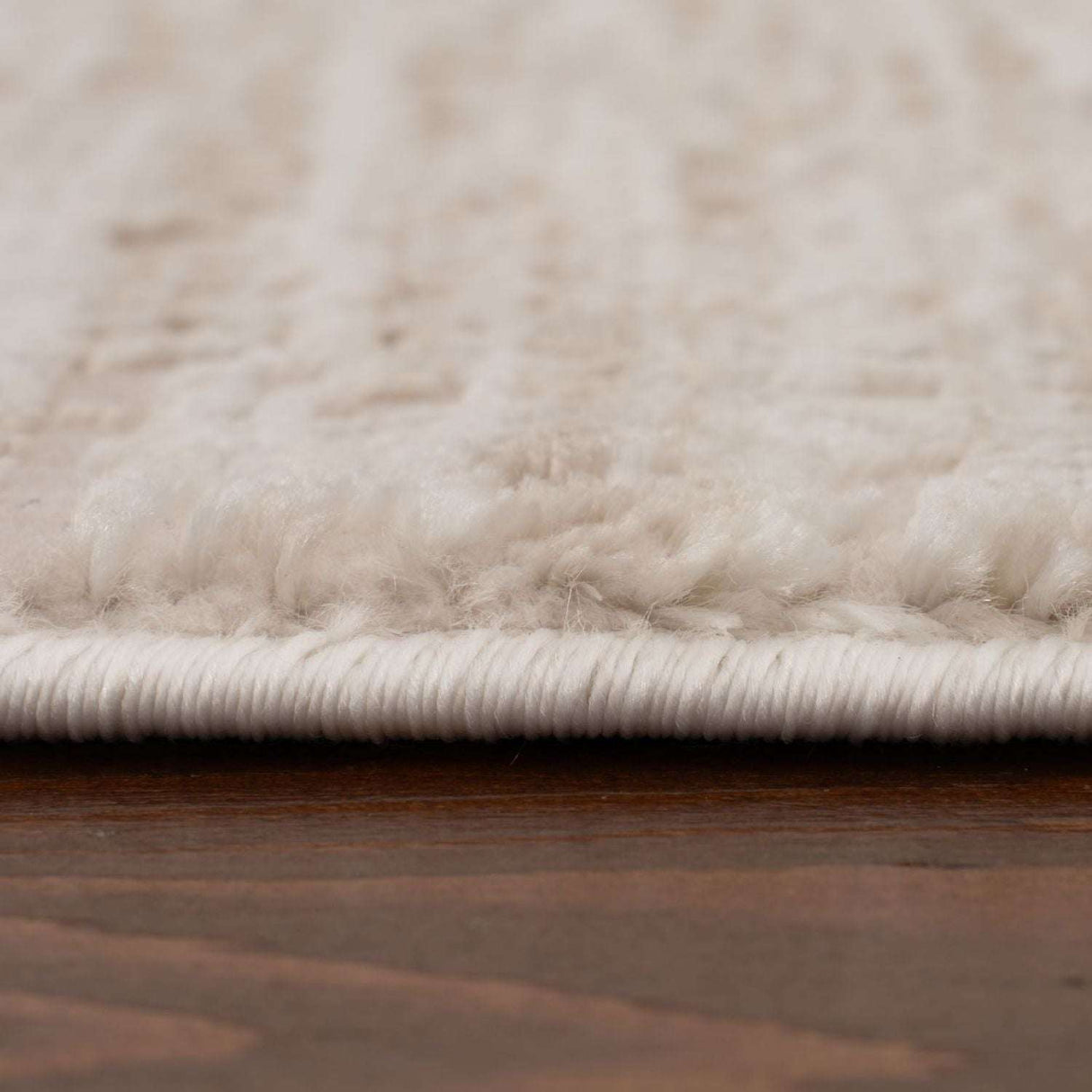 Soft white Abstract Rug with plush texture, perfect for enhancing living spaces