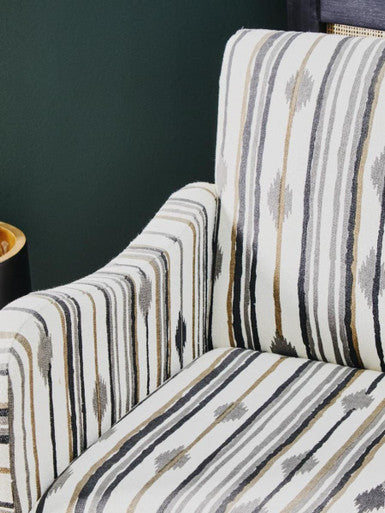 Orsina Accent Chair with a stylish striped pattern in neutral tones for modern interiors