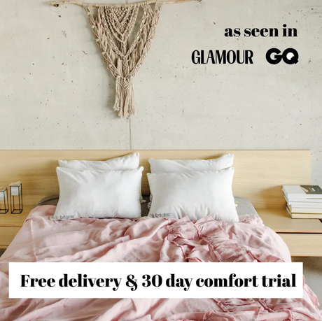 Brightr Sleep Adjustable Pillow Bundle on a stylish bed with a pink duvet for comfort and support.