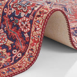 Close-up of Amata Rug with intricate patterns in red and blue tones for stylish home decor