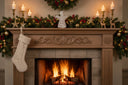 Elegant Angel Decoration on a festive mantel with stockings, candles, and a roaring fire