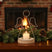 Angel Tealight holder with a white candle, surrounded by festive pinecones and Christmas decorations