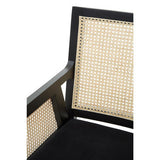 Orsina Arm Chair featuring woven rattan and sleek black frame for stylish lounge decor