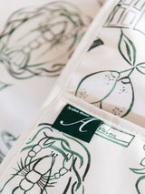 Avalon Home UK Oven Glove featuring intricate lobster and lemon illustrations in green tones