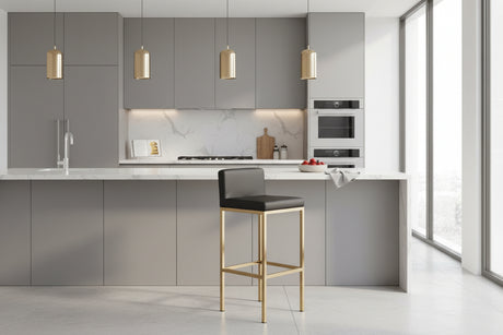 Orsina Modern Bar Chair with Gold Frame and Black Seat in a Contemporary Kitchen Setting