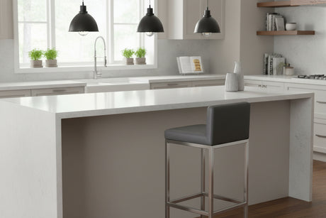 Orsina Bar Chair with a sleek design in a modern kitchen setting featuring a white countertop