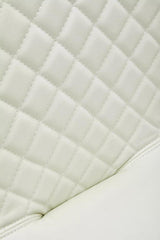 Close-up of the Orsina Bar Chair featuring a quilted synthetic leather finish in soft cream colour