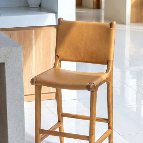 Stylish Bar Stool with a tan leather seat and wooden frame, ideal for modern kitchen interiors