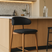 Nisu Home Bar Stool with Black Upholstered Seat and Wooden Legs for Modern Kitchens