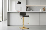 Orsina Bar Stool with Grey Upholstery and Gold Base in Modern Kitchen Setting
