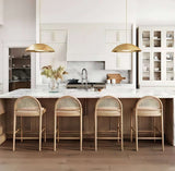 Nisu Home Bar Stool with a wooden frame and soft upholstered seat in a stylish kitchen setting