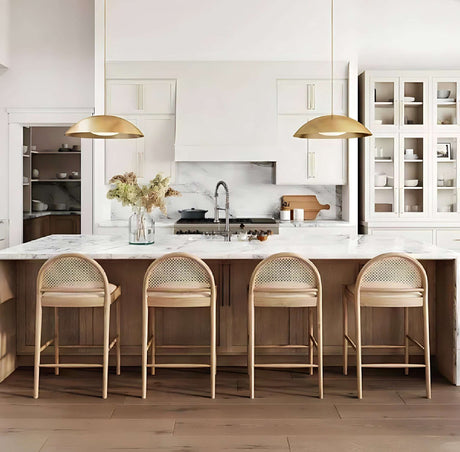 Nisu Home Bar Stool with a wooden frame and soft upholstered seat in a stylish kitchen setting