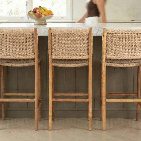 Natural bamboo bar stools with woven seats in a stylish kitchen setting