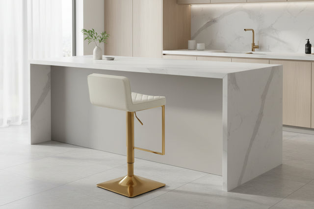 Orsina Bar Stool with White Vinyl Seat and Gold Base in a Modern Kitchen Setting