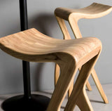 Stylish Nisu Home Bar Stool with a unique curved wooden seat and sleek design