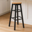 Orsina Bar Stool with a natural wood seat and sturdy black frame for modern kitchen seating