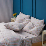 Complete Bedding Set by SHEET STORY featuring a colourful check pattern and multiple pillows