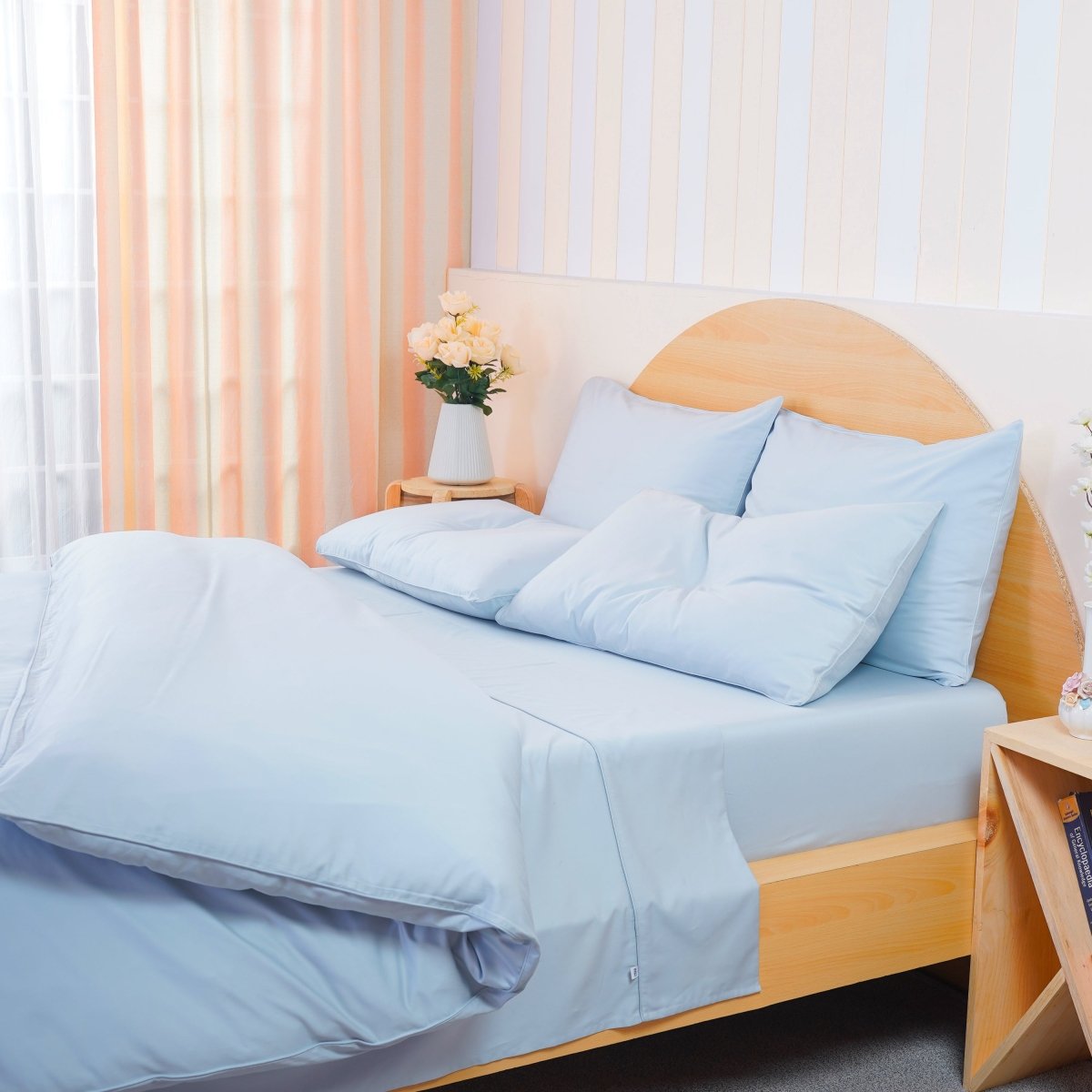 Complete Bedding Set by SHEET STORY in soft blue, featuring a duvet cover and pillow shams for a stylish bedroom