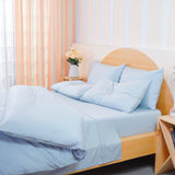 Complete Bedding Set by SHEET STORY in soft blue, featuring a duvet cover and pillow shams for a stylish bedroom