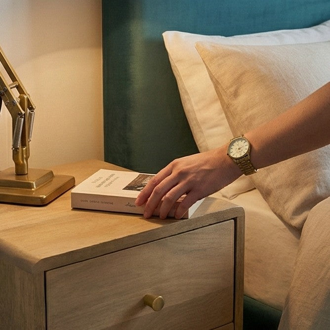 Fishe and Lilly bedside table with a book and a stylish lamp for modern bedroom decor