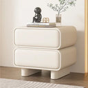 Modern Klassyx Bedside Table in cream with rounded edges and stylish decor atop