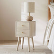 Fishe and Lilly stylish bedside table with two drawers and lamp on top, perfect for modern bedrooms